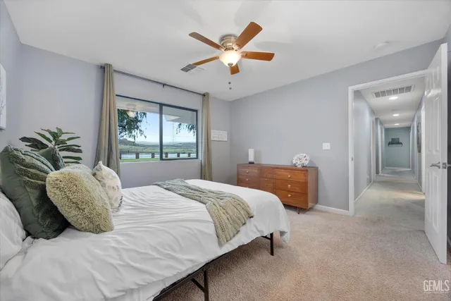 a view of house with backyard