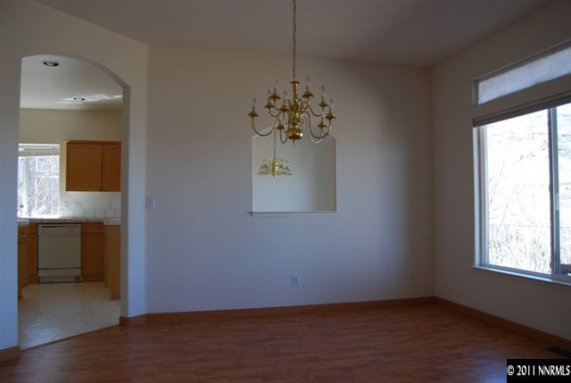 4731 West Creek Ridge Trail Reno, NV 89519 - Photo 3 of 10 an empty room with a window