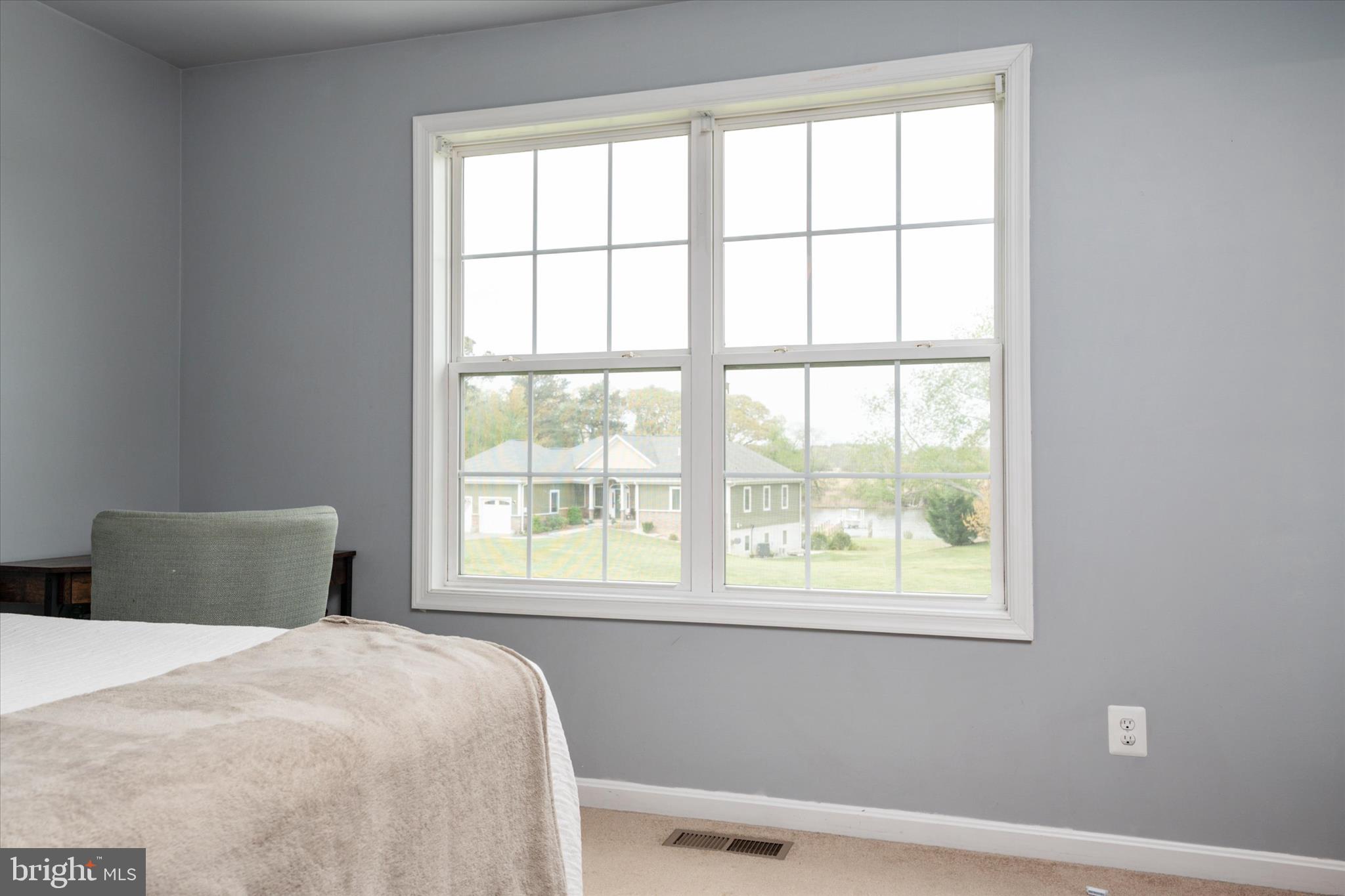 200 Newtown Road Chester, MD 21619 - Photo 24 of 50 a bedroom with a bed and a window