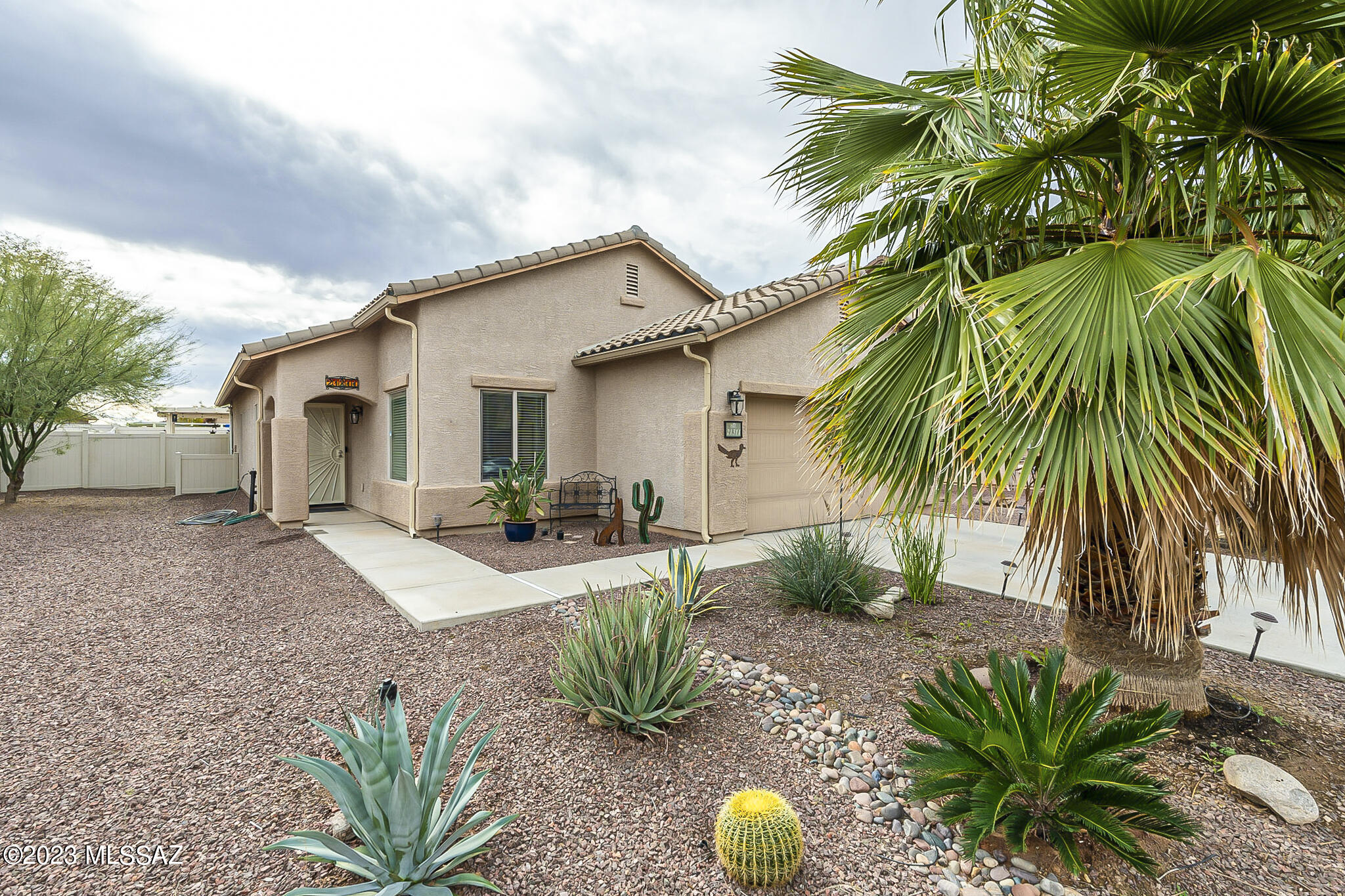 21311 East Founders Road Red Rock, AZ 85145 - Photo 19 of 20 a view of house with backyard and outdoor seating