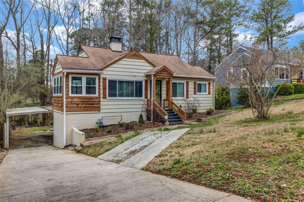 1747 Parkhill Drive Decatur, GA 30032 - Photo 1 of 1 a view of a house with a yard