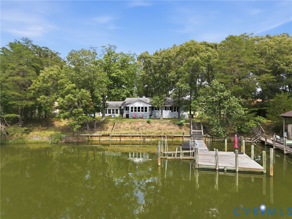 597 Harbor Drive Reedville, VA 22539 - Photo 1 of 34 Waterfront property featuring a private dock, boat