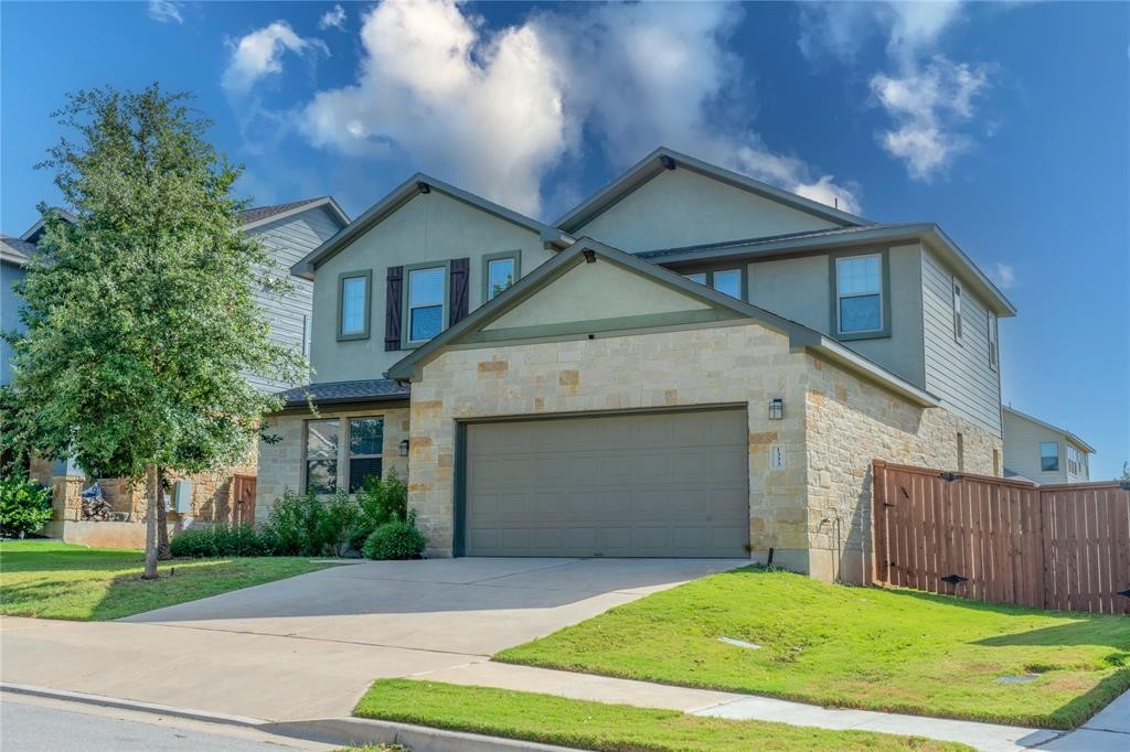 1333 Terrace View Drive Georgetown, TX 78628 - Photo 2 of 35 A striking contemporary residence boasts a stone and stucco facade with a convenient attached garage.