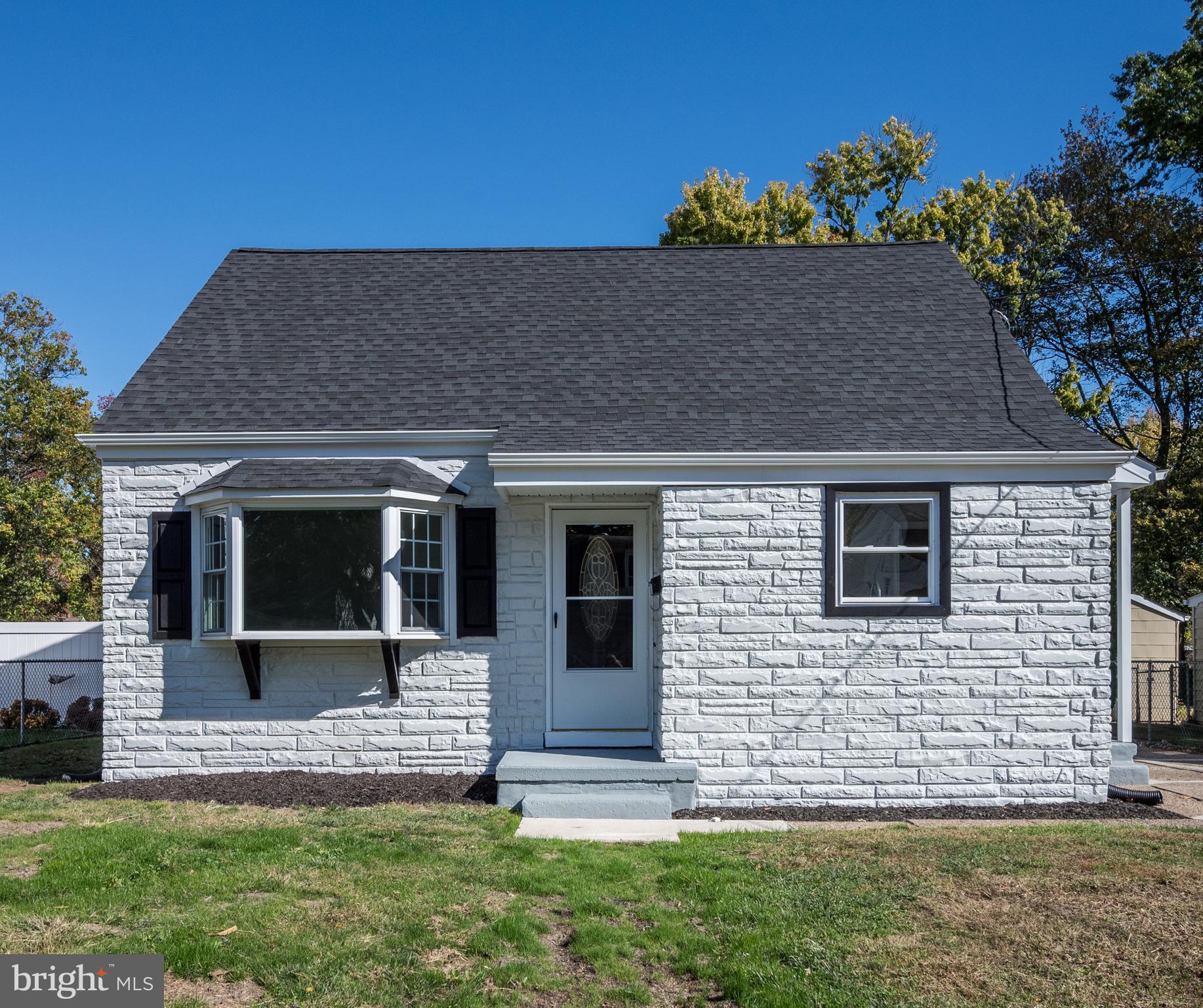 477 Buttonwood Avenue Maple Shade, NJ 08052 - Photo 1 of 32 a front view of a house with a garden
