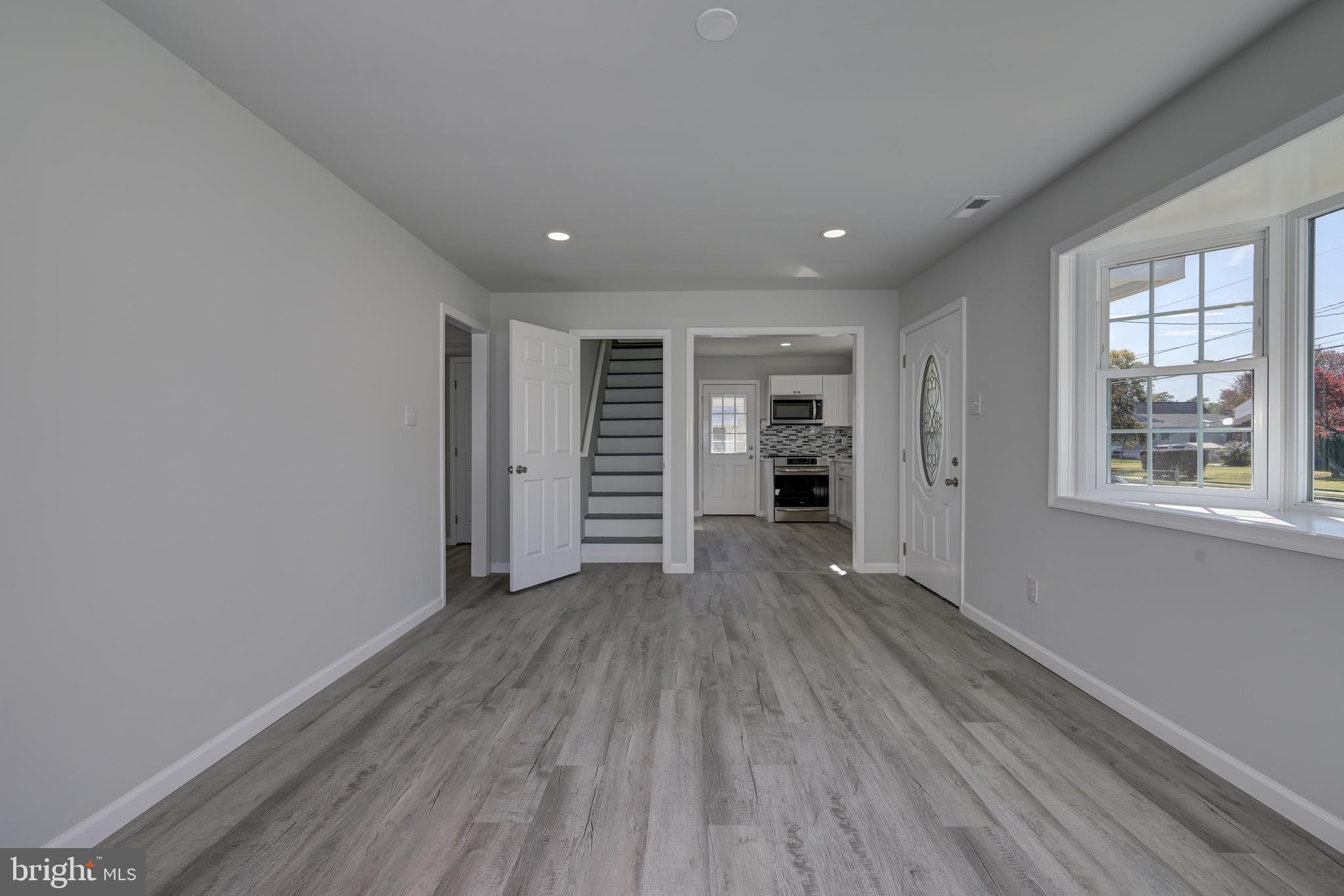 477 Buttonwood Avenue Maple Shade, NJ 08052 - Photo 20 of 32 a view of empty room with wooden floor and window