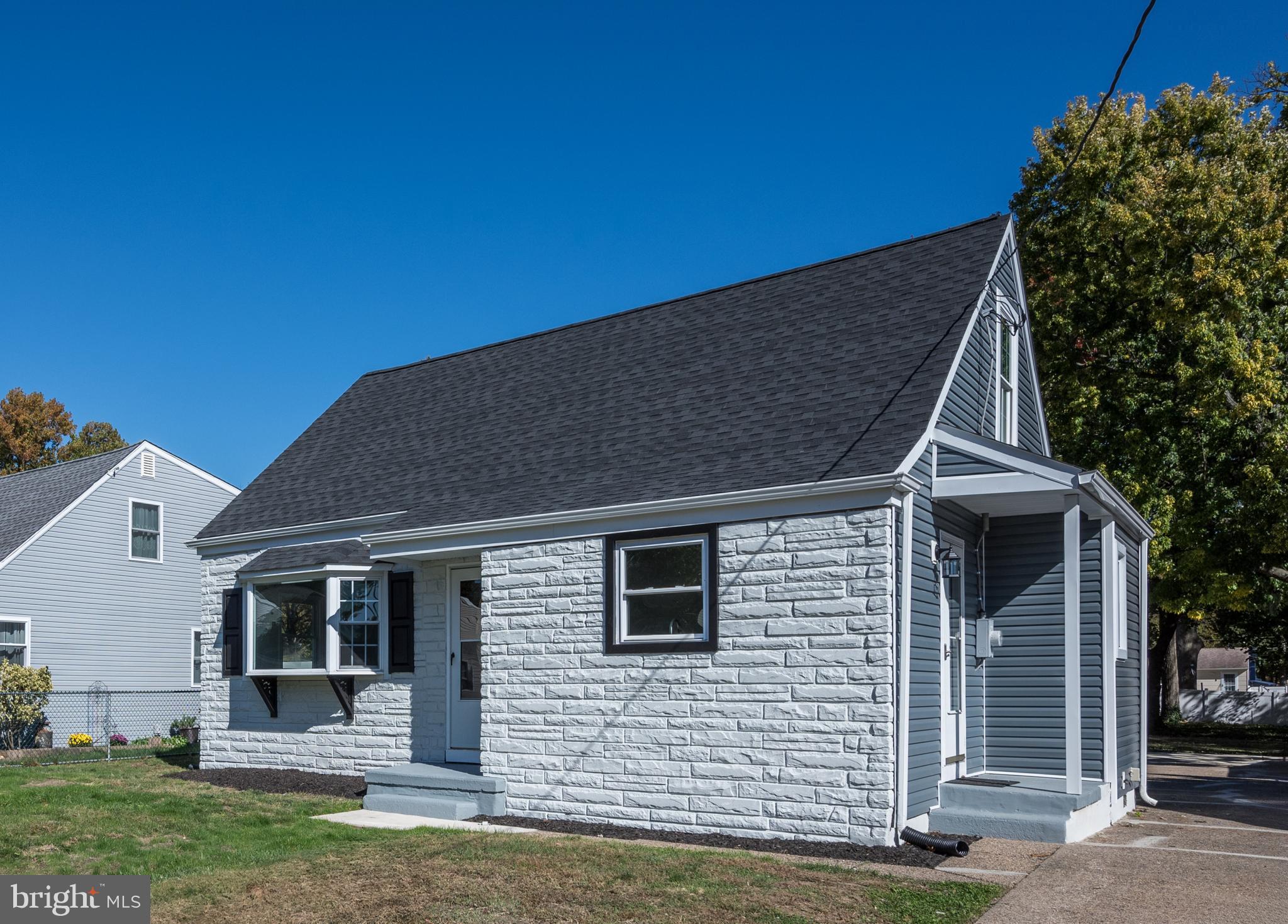 477 Buttonwood Avenue Maple Shade, NJ 08052 - Photo 3 of 32 a backyard of a house with seating space