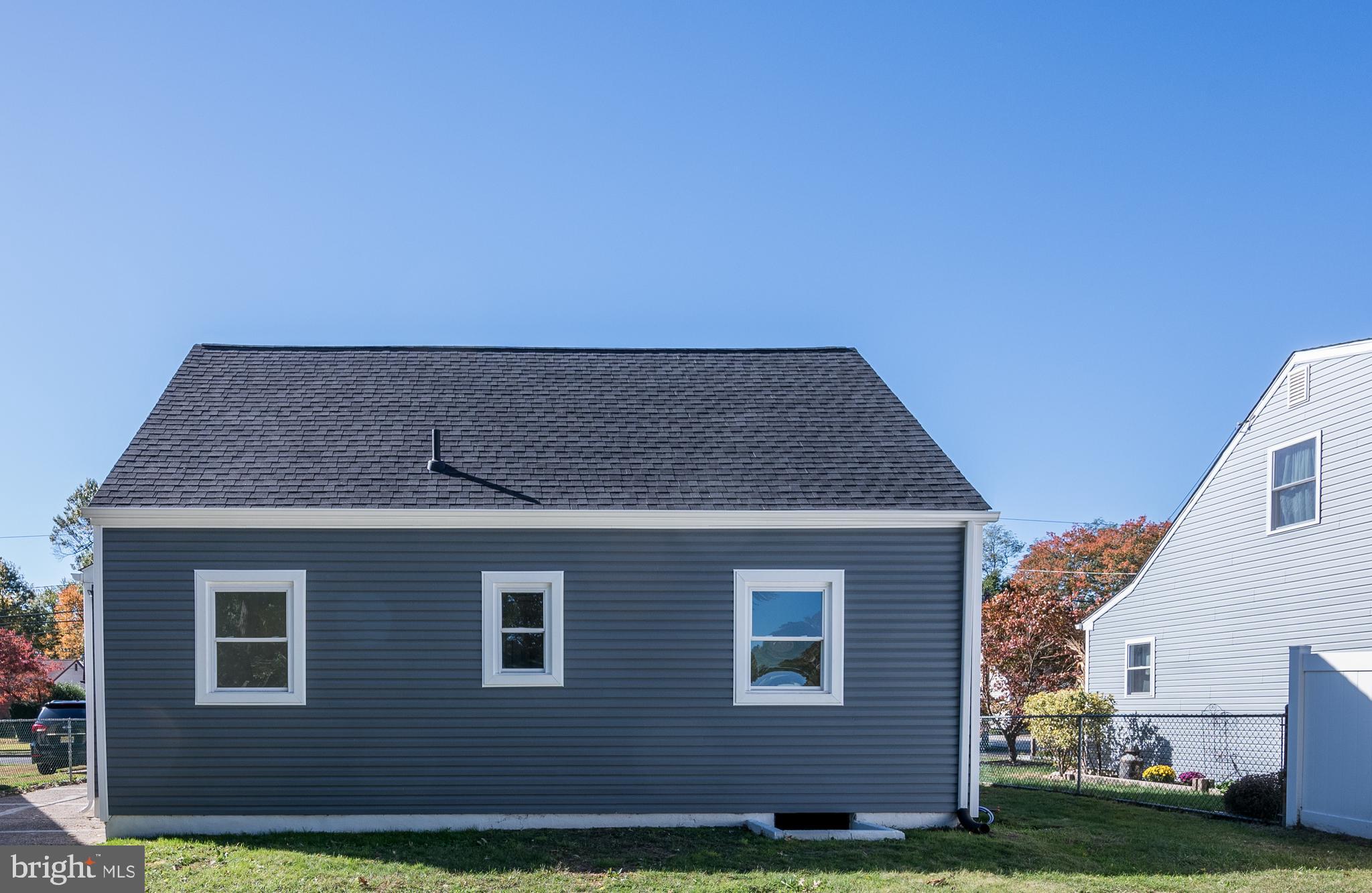 477 Buttonwood Avenue Maple Shade, NJ 08052 - Photo 6 of 32 a front view of a house with a yard