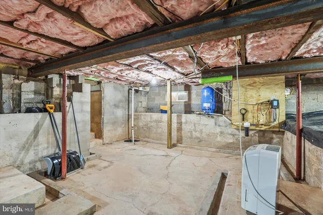 a view of a balcony with wooden floor and umbrella
