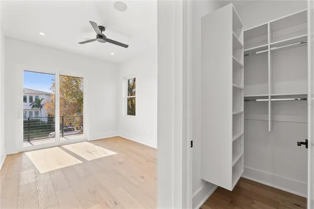 a bathroom with a shower toilet sink and mirror