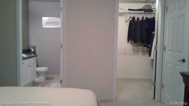 3699 Oakmonte Boulevard Rochester, MI 48306 - Photo 26 of 31 LOOKING INTO MASTER BATHROOM, AS WELL AS A PEEK INTO A SMALL PORTION OF THE MASTER WALK IN CLOSET.