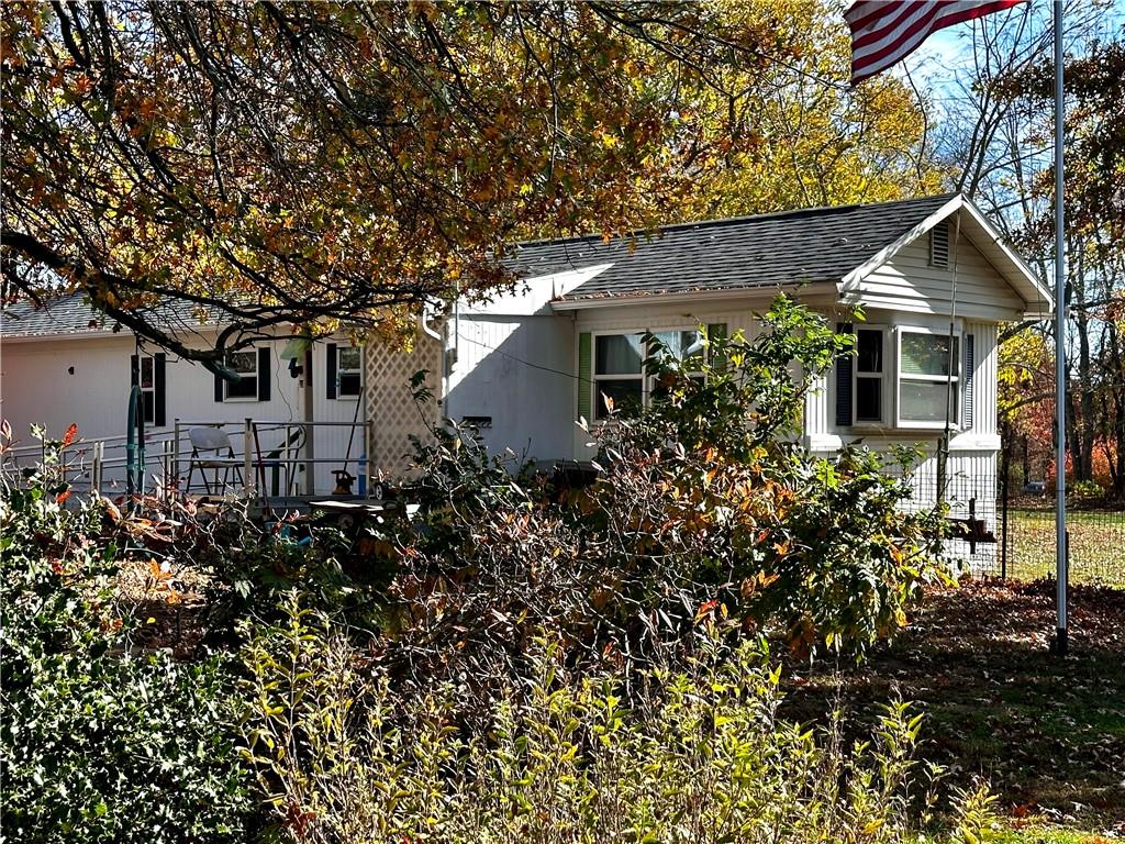 192 Pekar Road Point Marion, PA 15474 - Photo 7 of 16 a front view of a house with garden