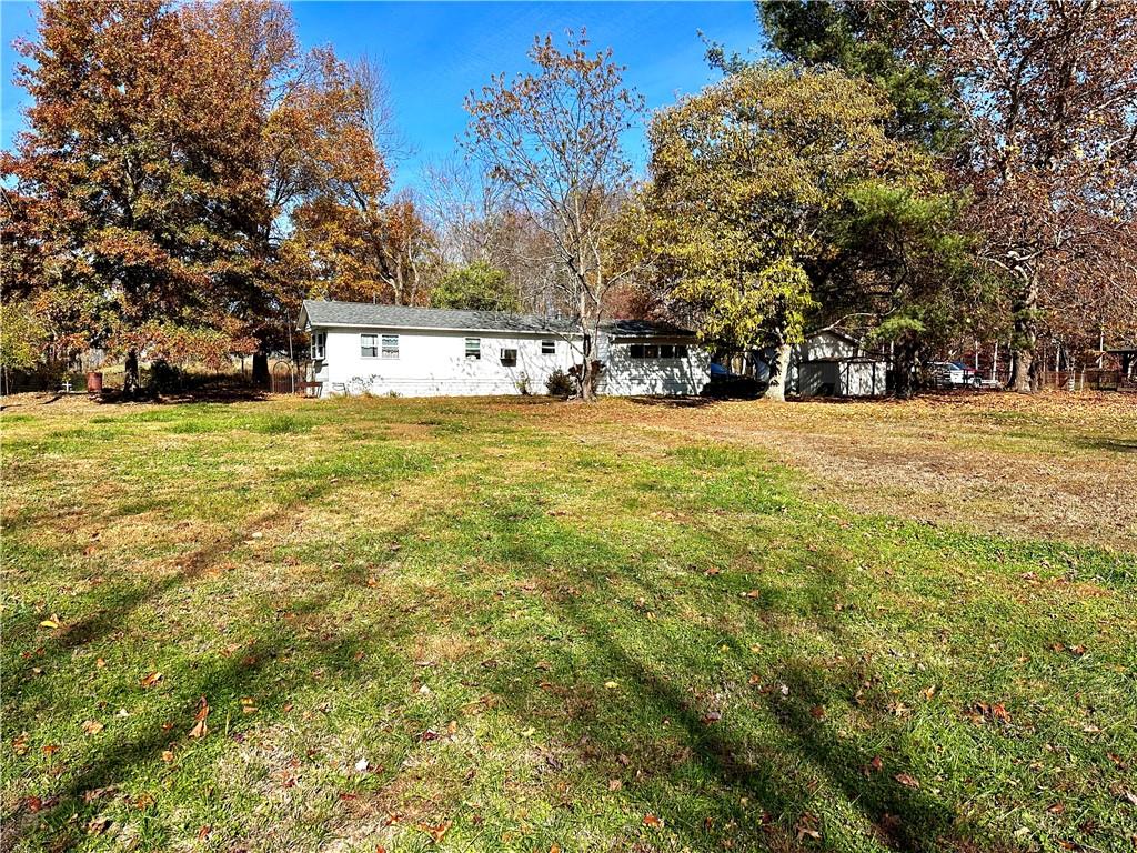 192 Pekar Road Point Marion, PA 15474 - Photo 10 of 16 a view of big yard with a house