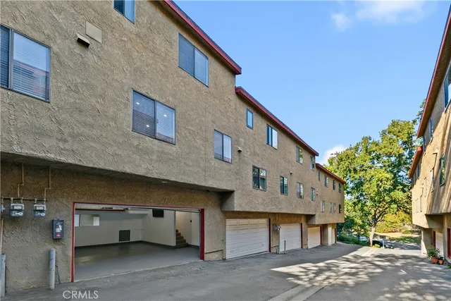 a view of a house with a street
