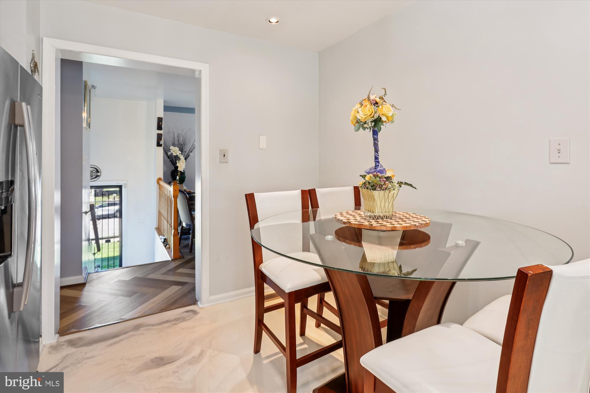 3115 Ripple Road Windsor Mill, MD 21244 - Photo 5 of 19 a view of a dining room with furniture and wooden floor