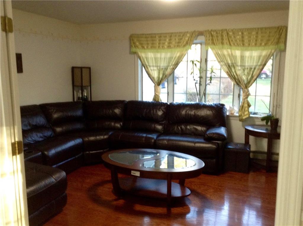 181 Durham Road Freeport, ME 04032 - Photo 9 of 23 Living room with hardwood and bay window