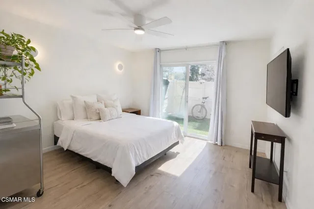 a bedroom with a bed and a closet