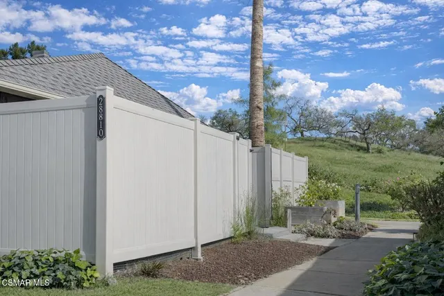 a view of a back yard of the house