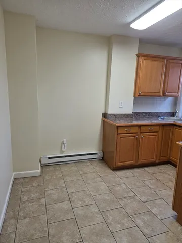 a view of a kitchen with a sink