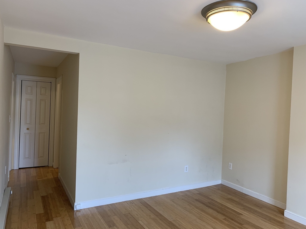 531 Cambridge Street, Unit 2 Cambridge, MA 02141 - Photo 21 of 22 wooden floor in an empty room