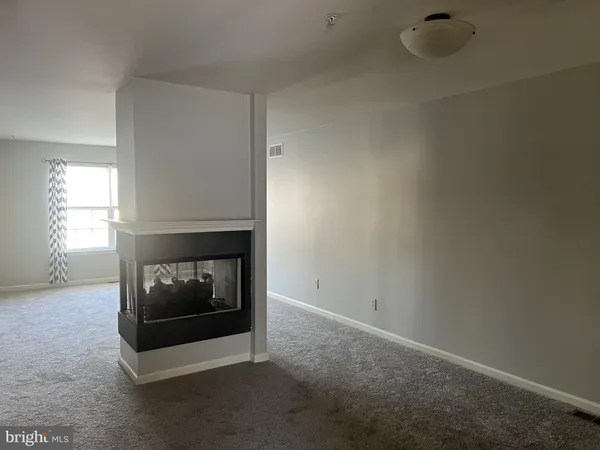 a room with a fireplace
