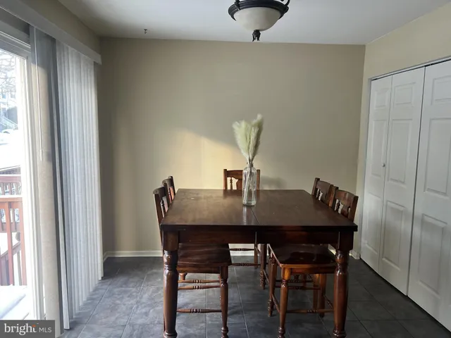 a view of a table and chairs in a room