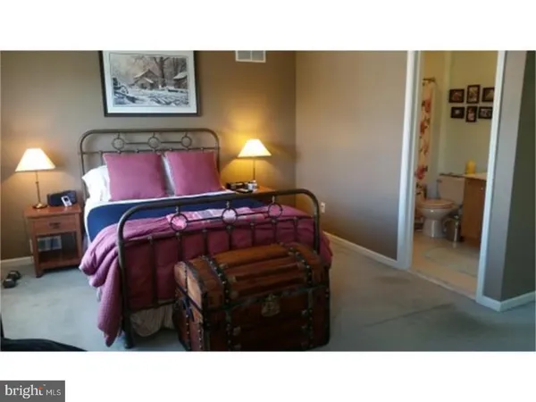 a black and white photo of a living room