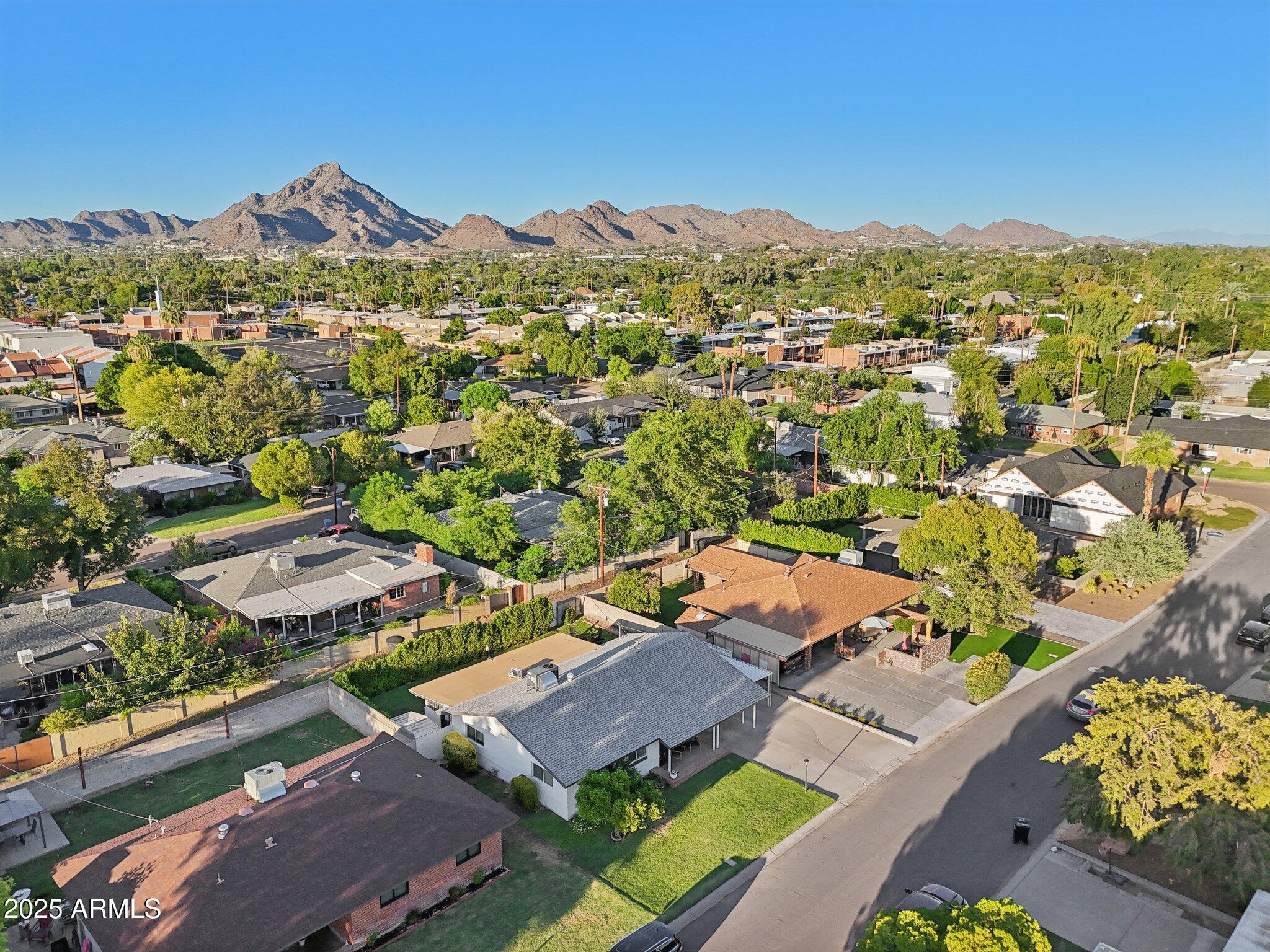 1816 East Colter Street Phoenix, AZ 85016 - Photo 2 of 2 an aerial view of residential houses with outdoor space
