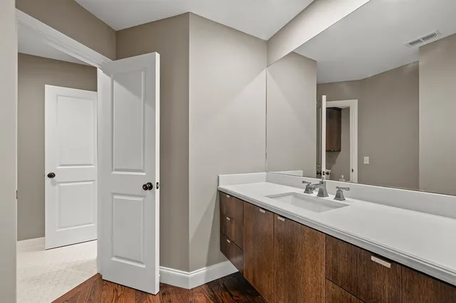 a view of a porch with furniture and garden