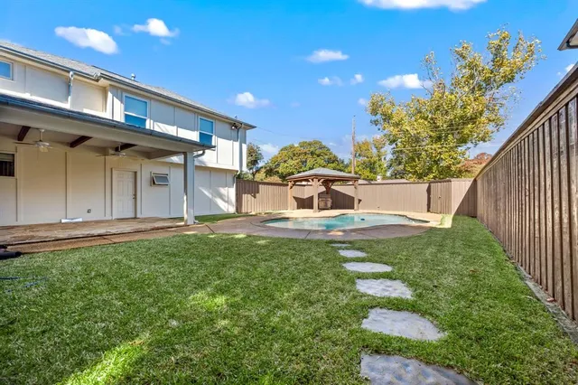 an aerial view of a town with couple of houses