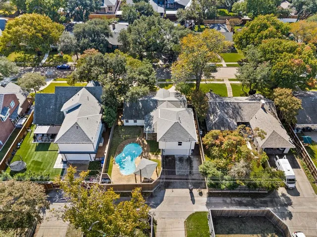 an aerial view of a town with couple of houses