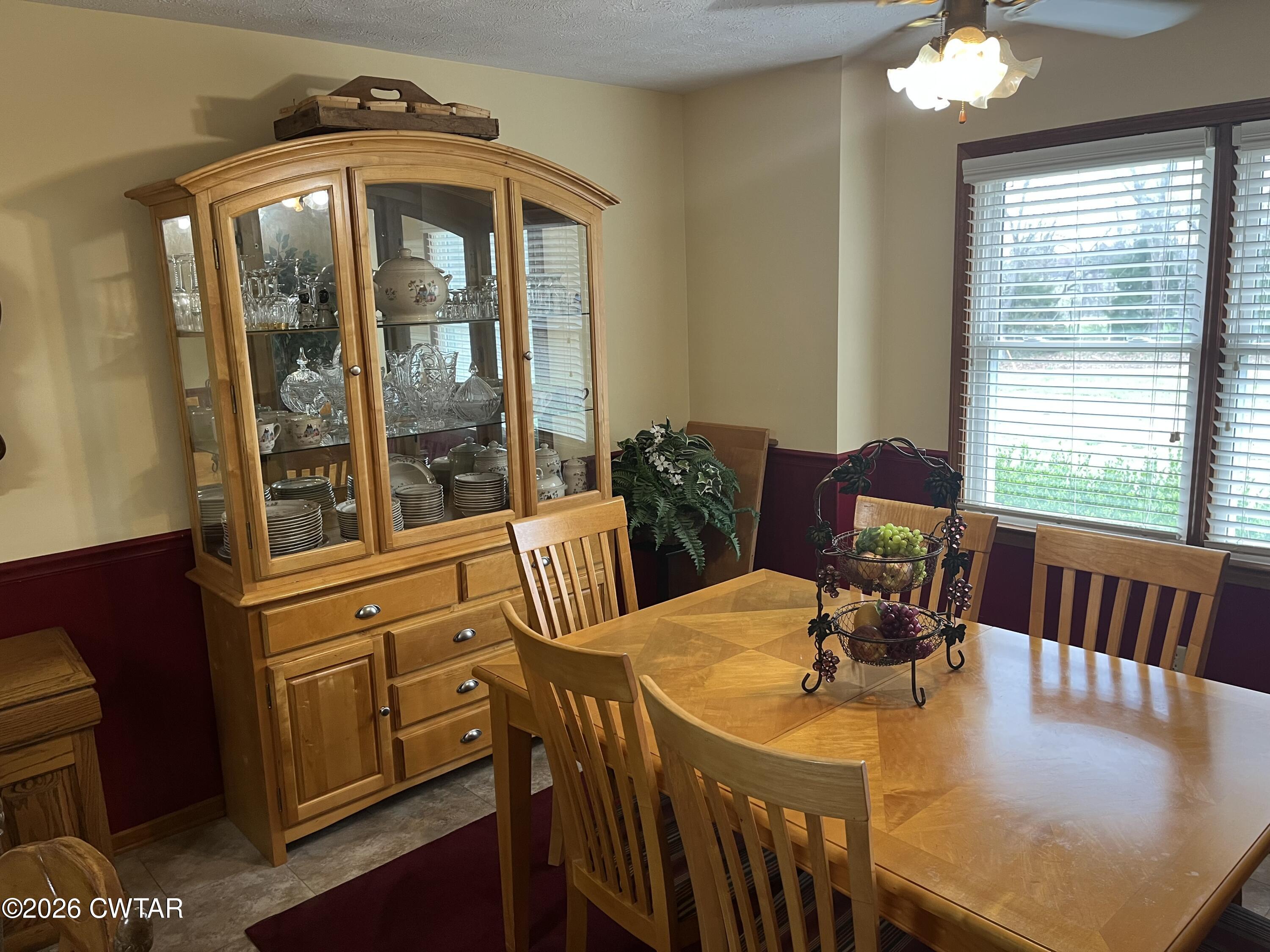 20 Homer Craig Road Humboldt, TN 38343 - Photo 11 of 28 a view of a dining room with furniture window and outside view