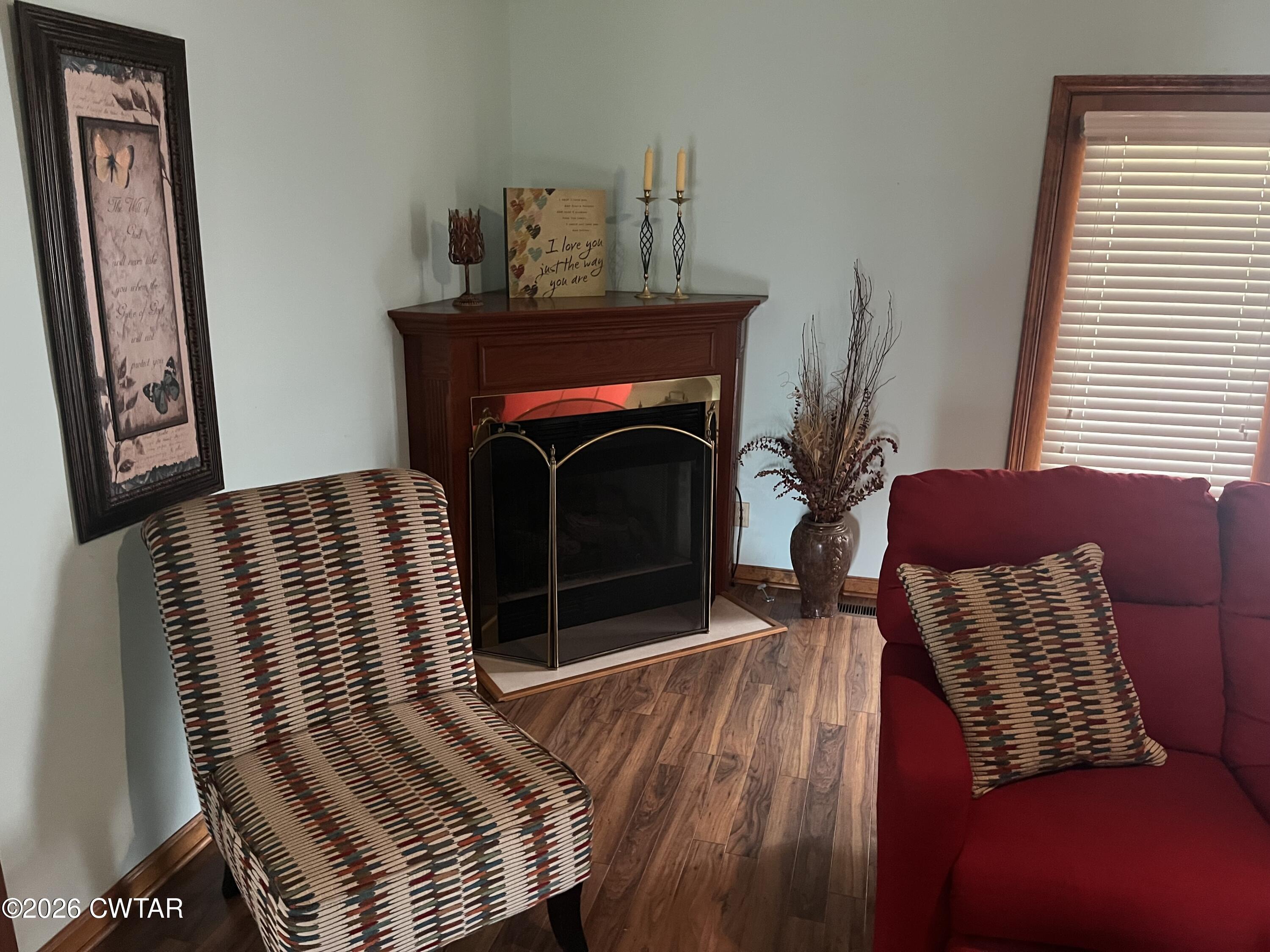 20 Homer Craig Road Humboldt, TN 38343 - Photo 14 of 28 a bedroom with a bed and a fireplace