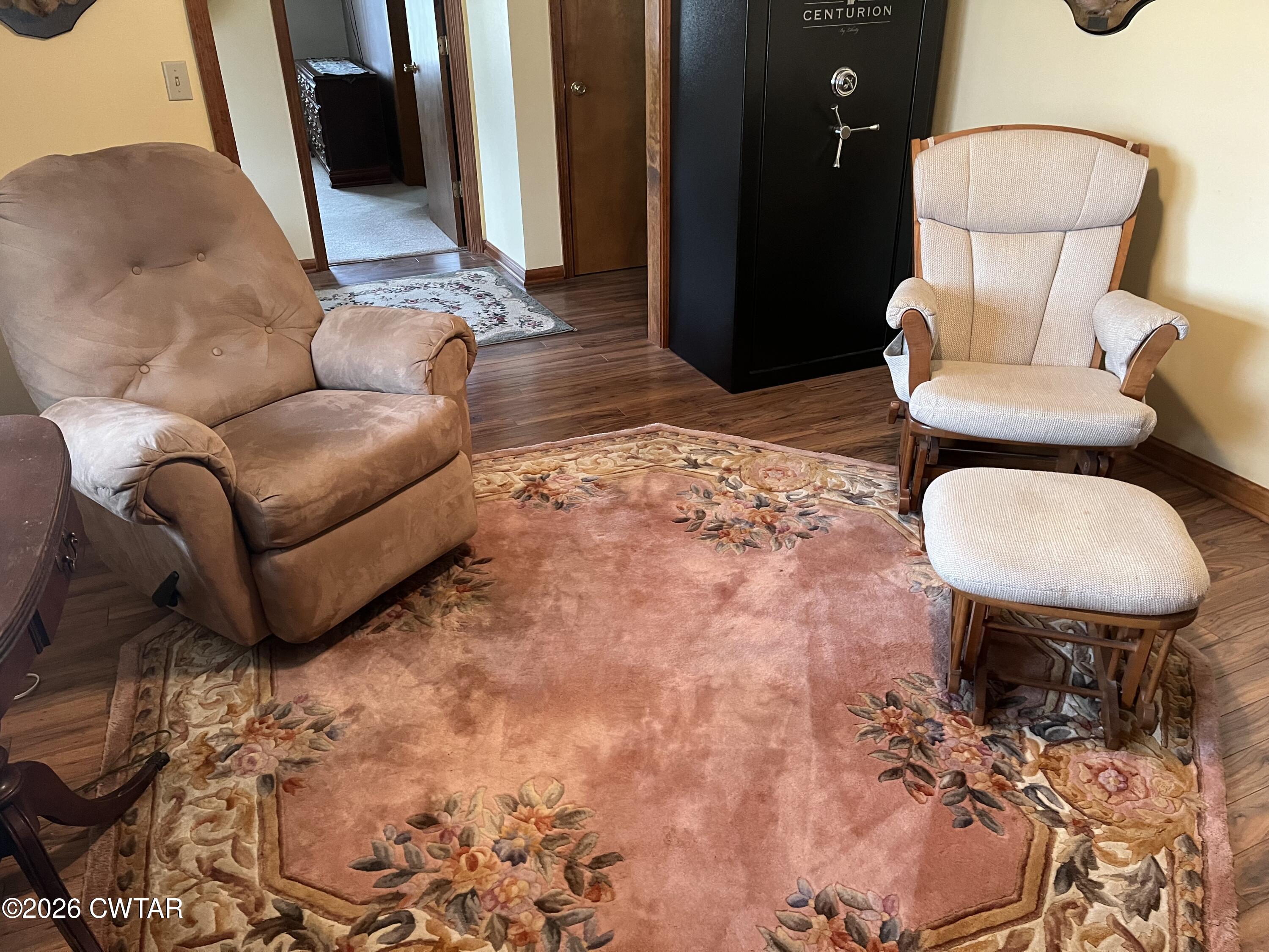 20 Homer Craig Road Humboldt, TN 38343 - Photo 15 of 28 a living room with furniture and a rug