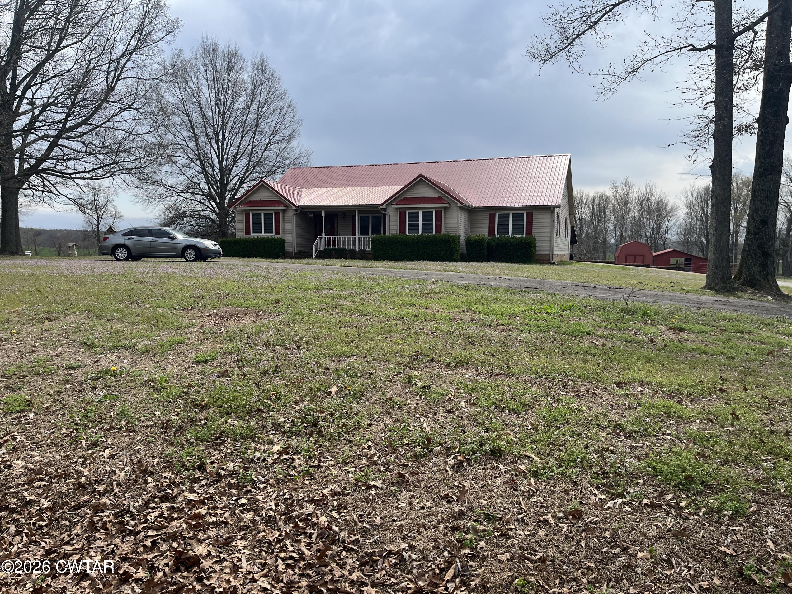 20 Homer Craig Road Humboldt, TN 38343 - Photo 2 of 28 a front view of a house with a yard