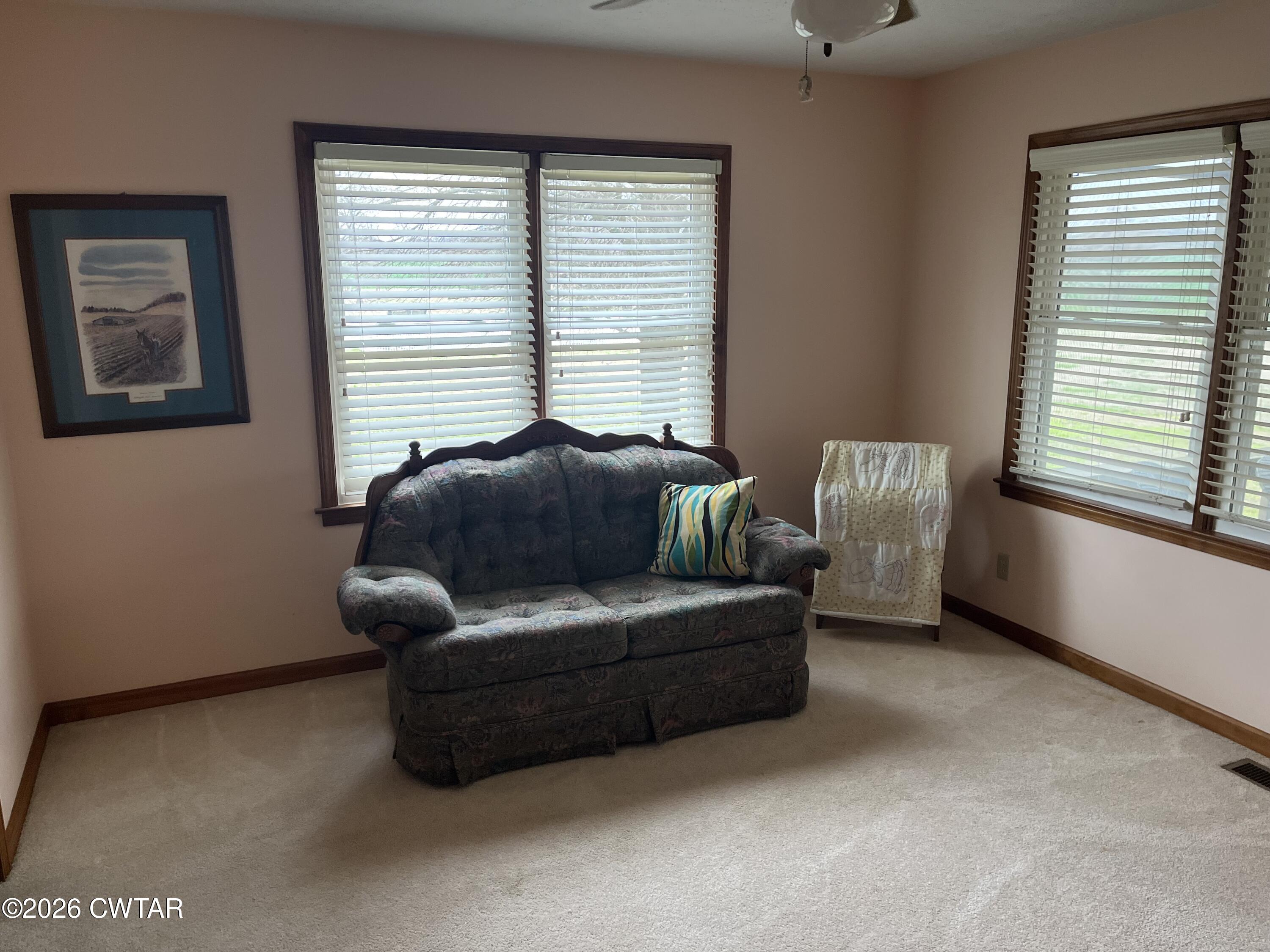 20 Homer Craig Road Humboldt, TN 38343 - Photo 22 of 28 a living room with furniture and a window