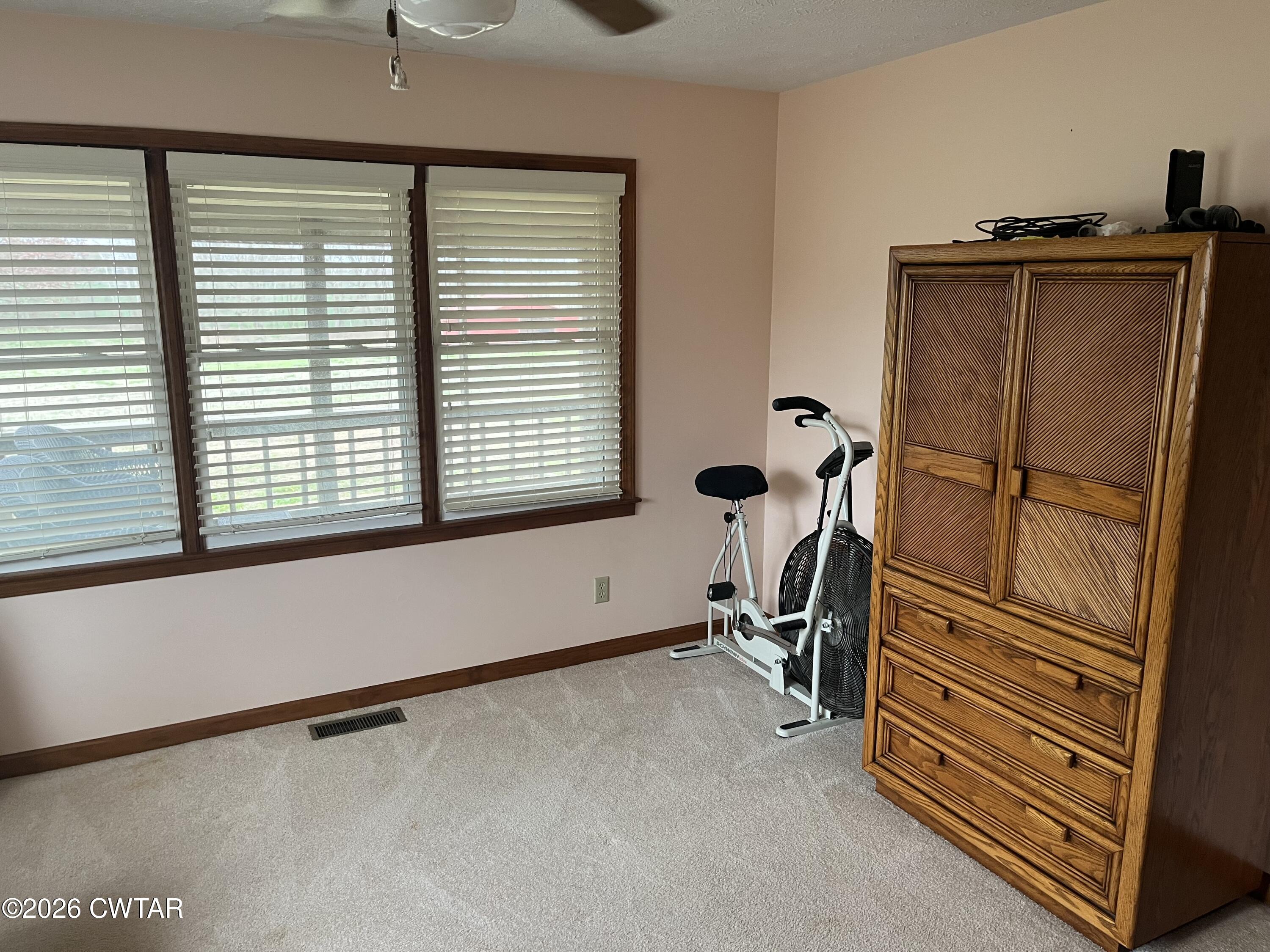 20 Homer Craig Road Humboldt, TN 38343 - Photo 23 of 28 a view of a room with gym equipment and a window