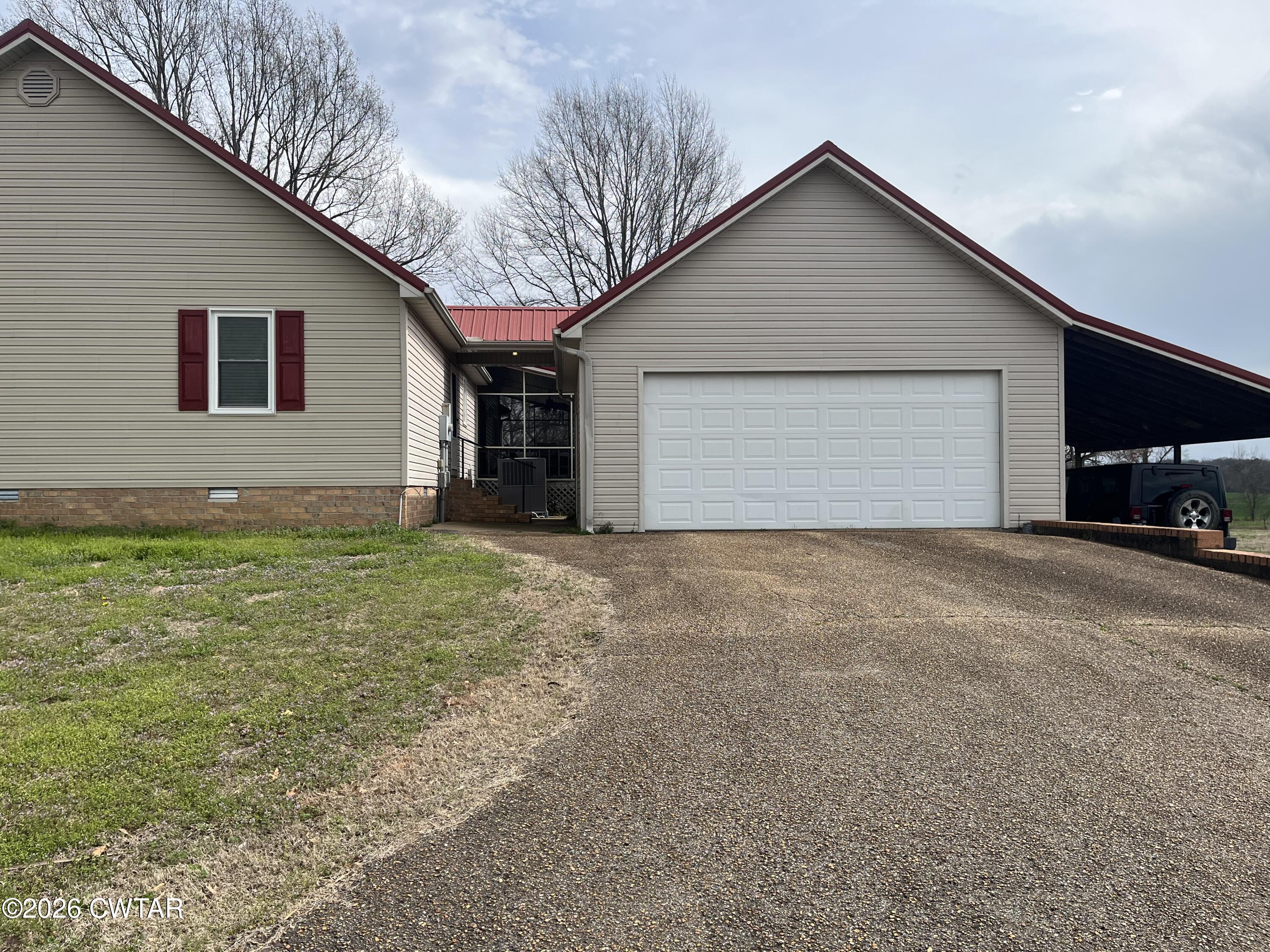 20 Homer Craig Road Humboldt, TN 38343 - Photo 3 of 28 a view of garage yard and garage