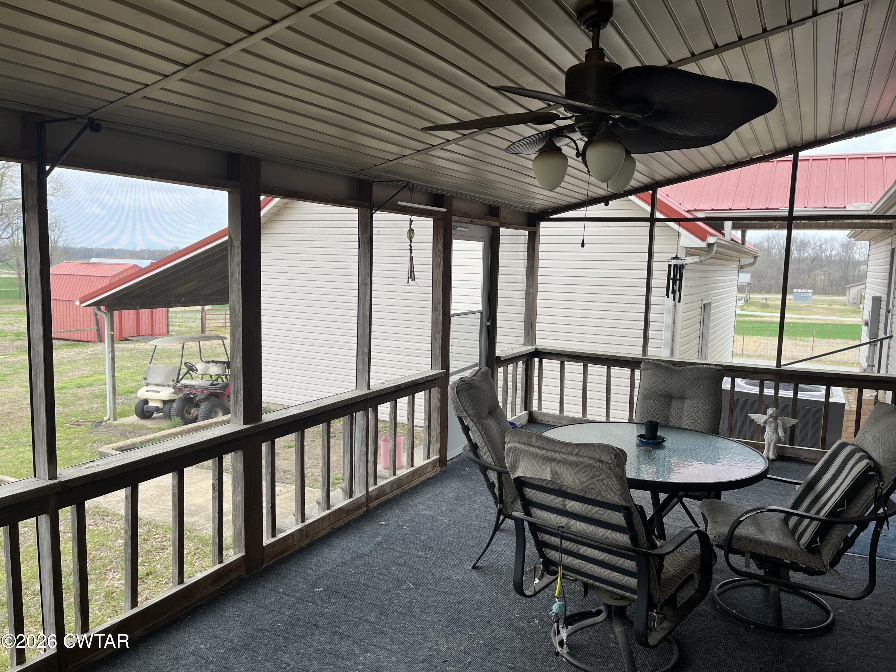 20 Homer Craig Road Humboldt, TN 38343 - Photo 5 of 28 a view of a patio with a table chairs and a grill