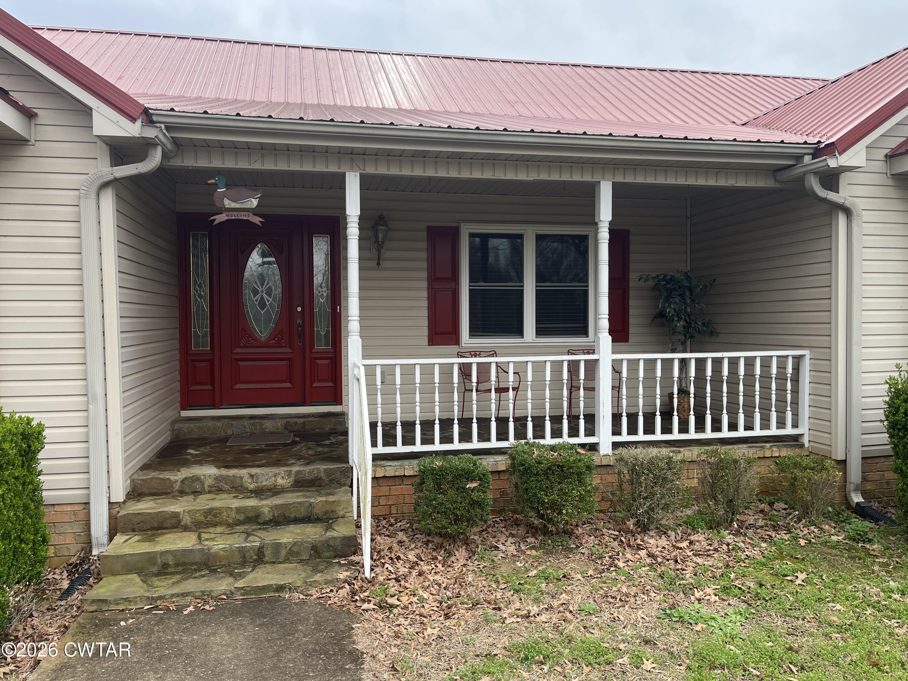20 Homer Craig Road Humboldt, TN 38343 - Photo 7 of 28 a view of a house with a small window and stairs