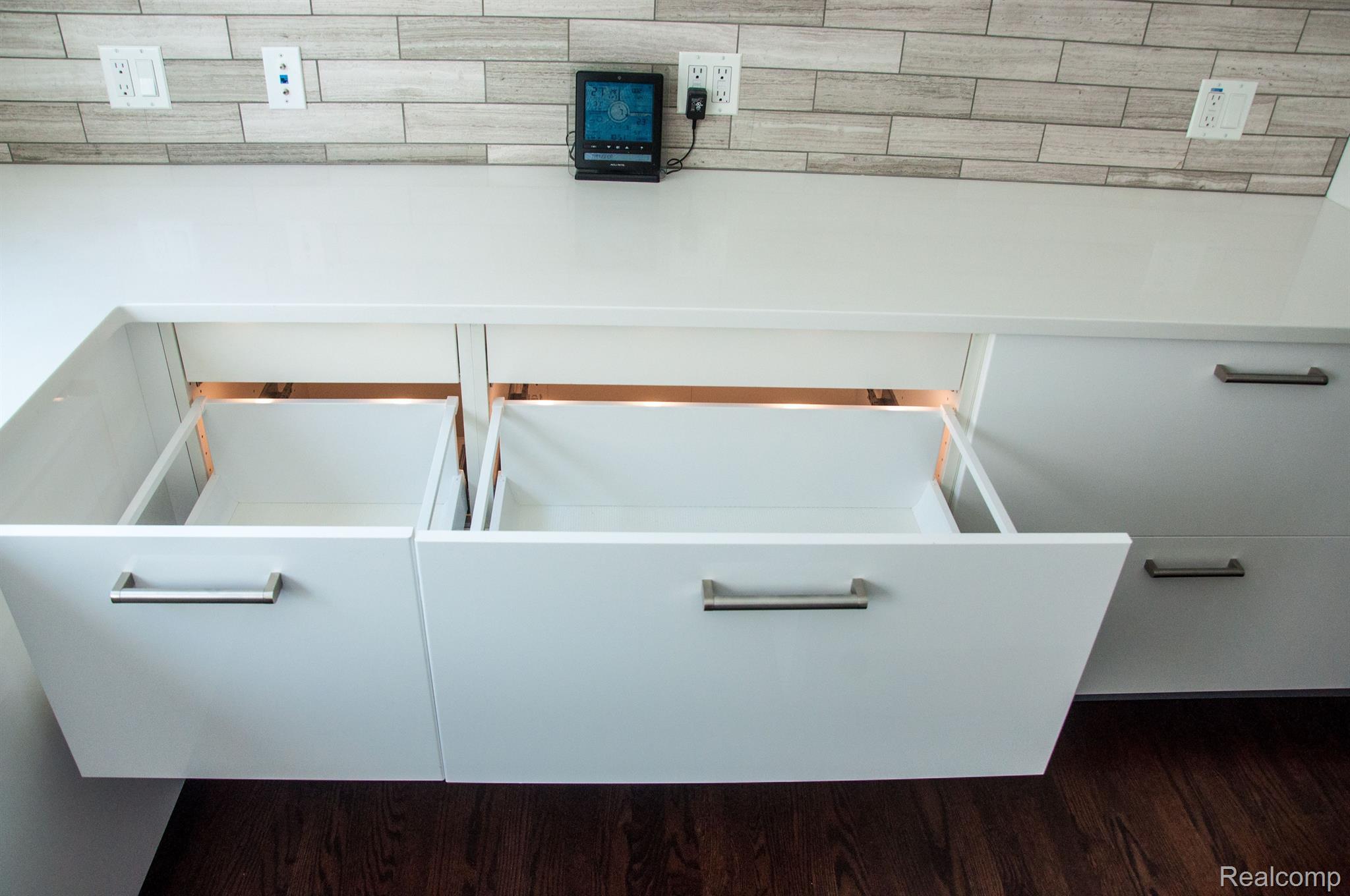 634 Millstone Drive Rochester, MI 48309 - Photo 27 of 52 Lighted kitchen storage