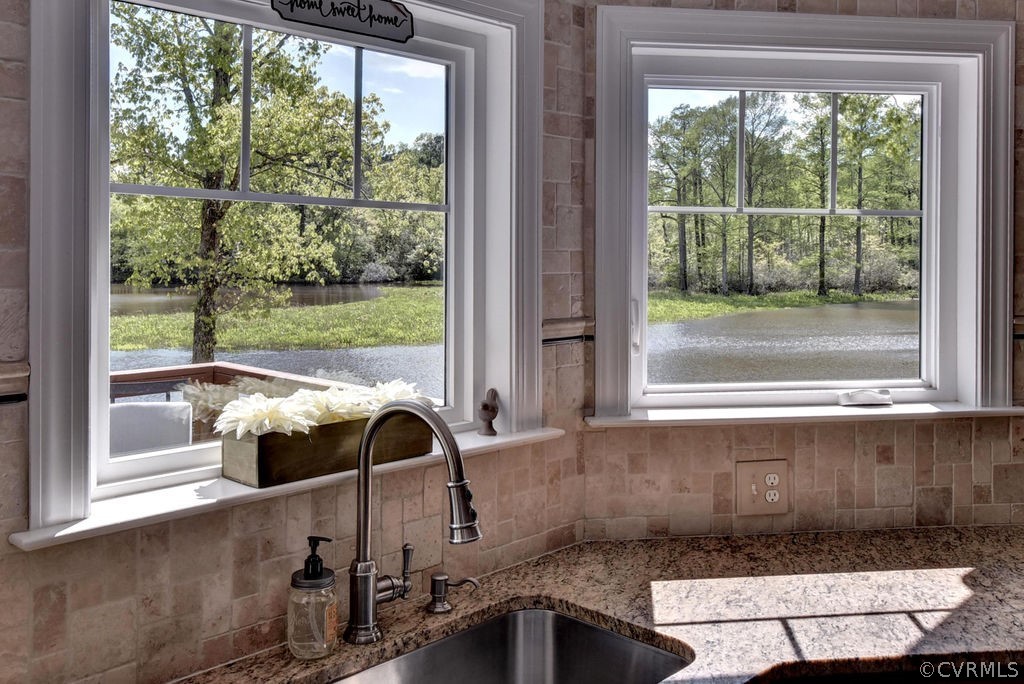 258 Sandy Bay Road Williamsburg, VA 23185 - Photo 13 of 50 a bathroom with a sink and bathtub