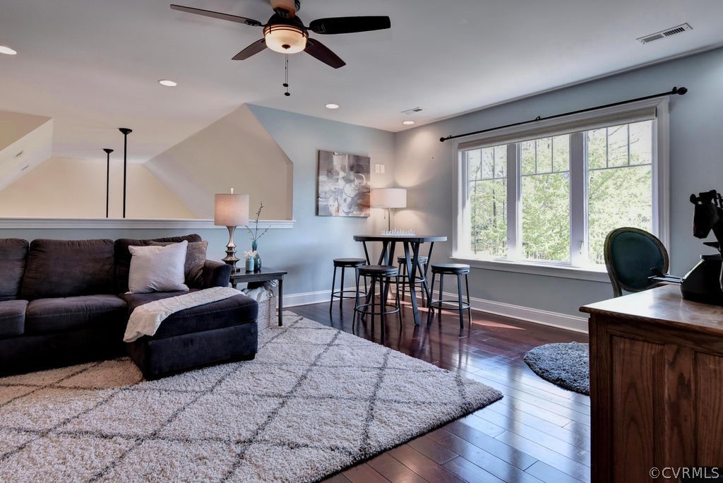 258 Sandy Bay Road Williamsburg, VA 23185 - Photo 25 of 50 a living room with furniture and a large window