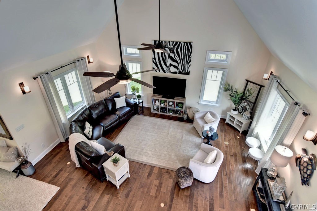 258 Sandy Bay Road Williamsburg, VA 23185 - Photo 27 of 50 a living room with furniture and a fireplace