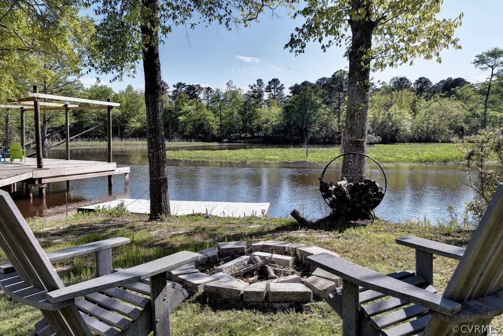 258 Sandy Bay Road Williamsburg, VA 23185 - Photo 39 of 50 a view of a lake from a balcony with outdoor space