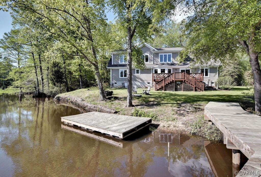 258 Sandy Bay Road Williamsburg, VA 23185 - Photo 41 of 50 a wooden bench sitting next to a yard