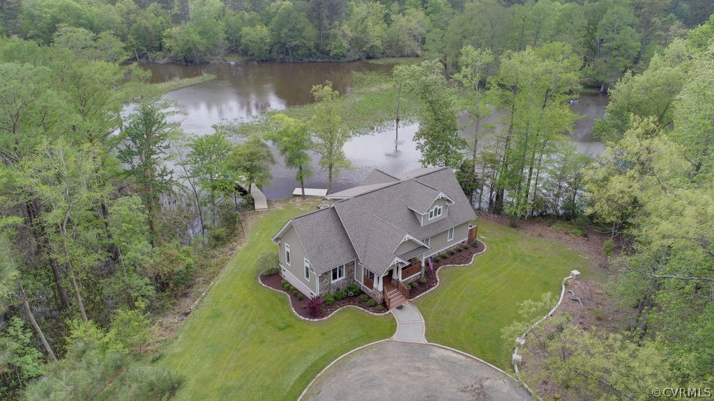 258 Sandy Bay Road Williamsburg, VA 23185 - Photo 43 of 50 an aerial view of a house with outdoor space and a lake view