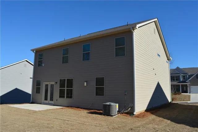 a view of house with an outdoor space