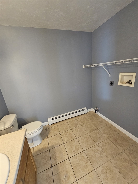 40 Merrick Street, Unit A Worcester, MA 01609 - Photo 12 of 32 a bathroom with a sink