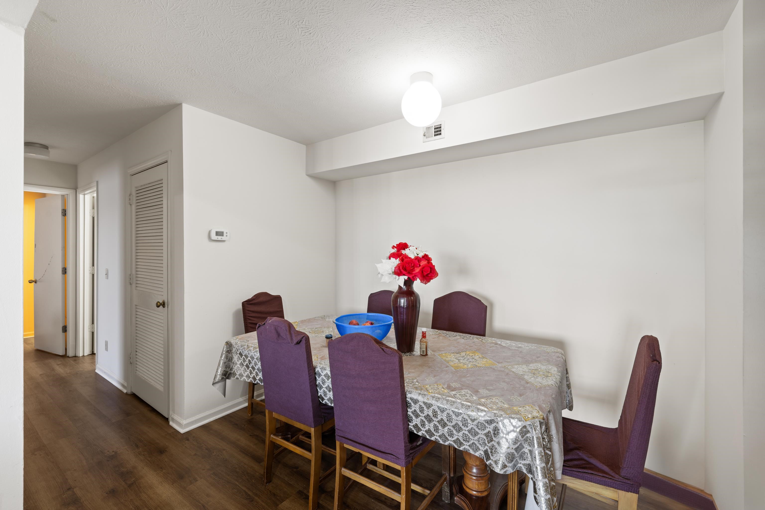 1116 Blue Ridge Drive, Unit 11 Harrisonburg, VA 22802 - Photo 11 of 21 a view of a dining room with furniture and wooden floor