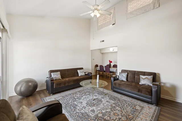 a kitchen with sink a stove and cabinets
